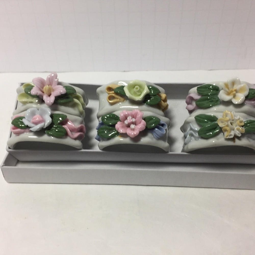 Vintage porcelain napkin rings 6 with flowers